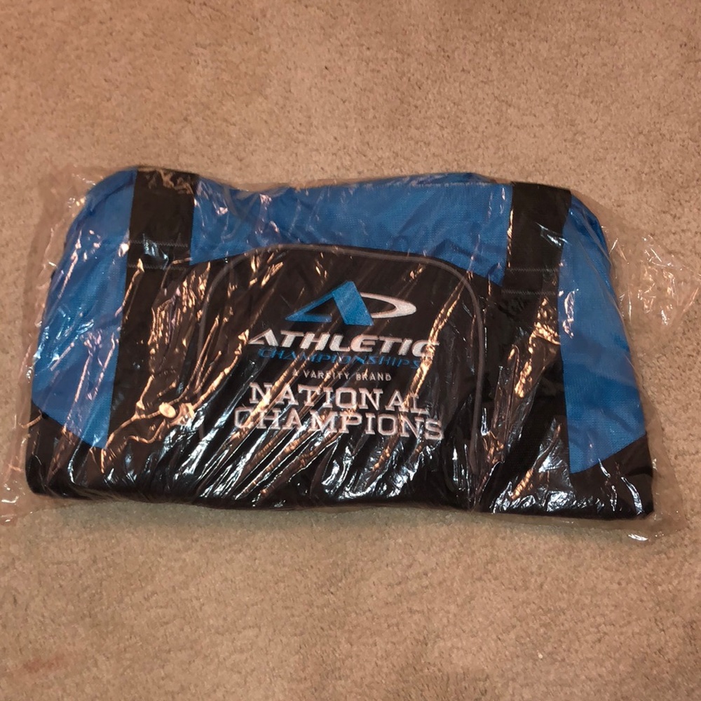 still in package cheer comp duffle bag.